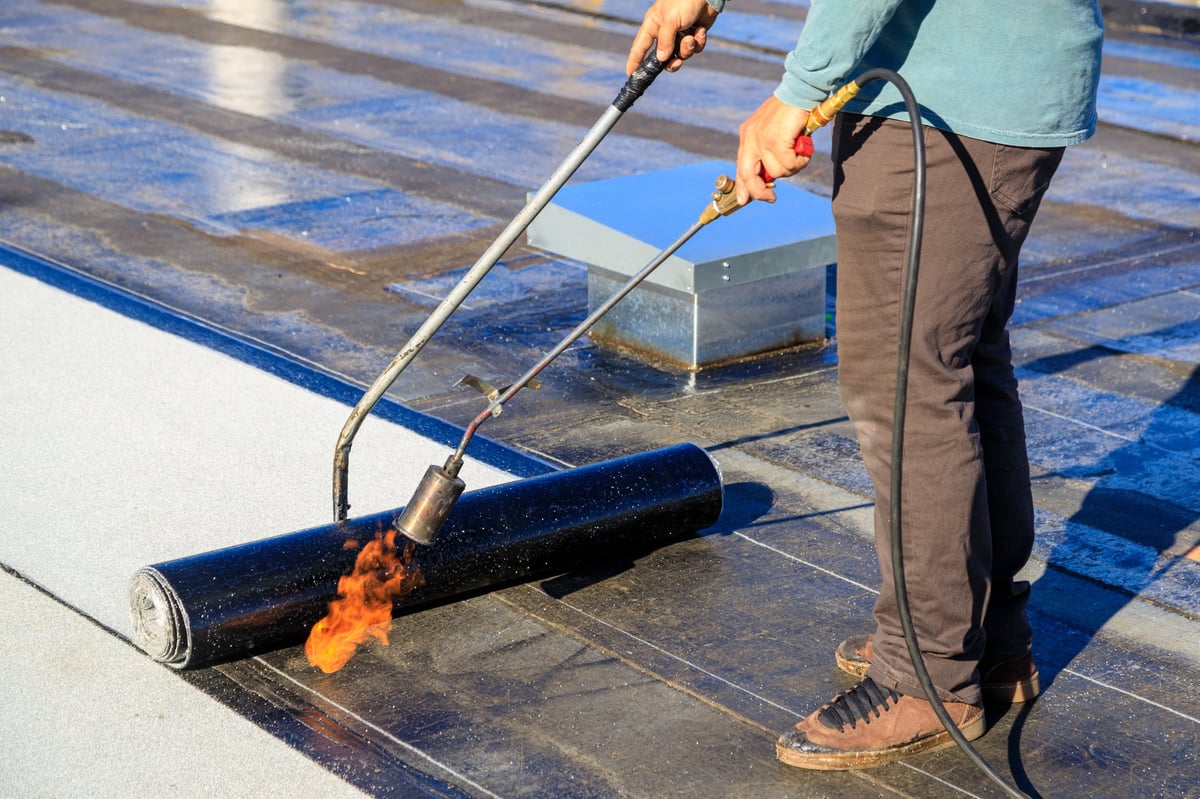 Commercial modified bitumen roofing installation