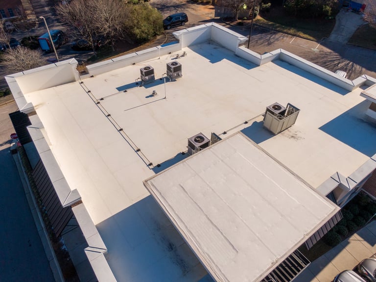Commercial TPO roofing project with aerial view